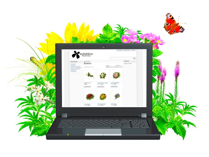 Laptop and green leaves. Isolated over white